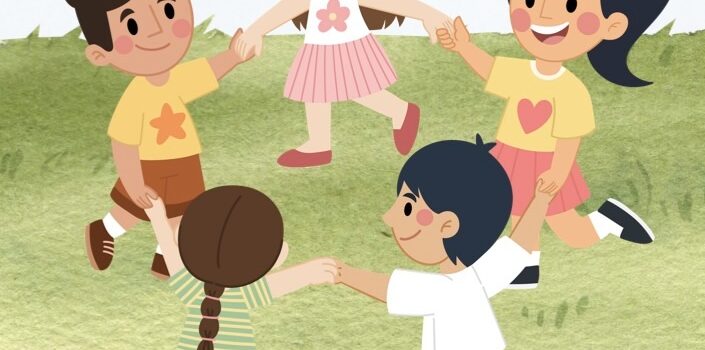 Bambini che fanno il girotondo sul prato